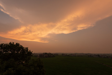 Composition of beautiful sky background, forest and sunset.