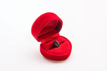 Coffee bean concept in wedding ring box