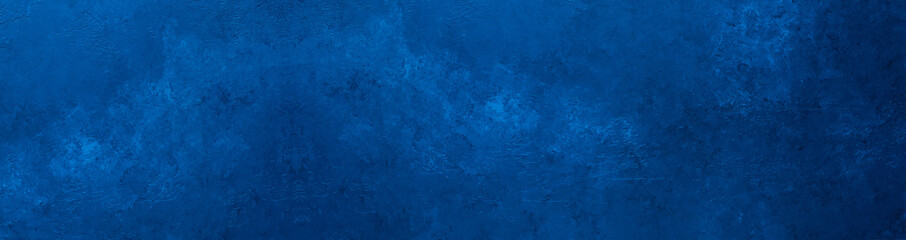 Abstract grunge decorative background toned classic blue color. Long banner. Old textured background