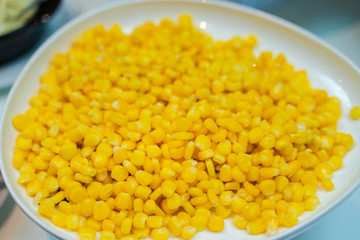 Fried corn with butter and seasonings