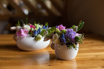 horizontal photo of colorful flower arrangements