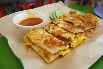 Roti (also known as chapati) is a flatbreadoriginating from the Indian subcontinent, made from stoneground wholemeal flour.