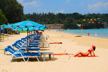 Sunbathing is a way to rest of foreign tourist. More tourists visit to Karon Beach for Sunbath in the morning until afternoon.