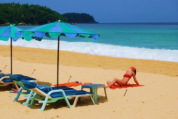 Sunbathing is a way to rest of foreign tourist. More tourists visit to Karon Beach for Sunbath in the morning until afternoon.