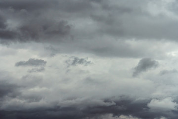 Fototapeta na wymiar Background of dark rainy clouds before thunderstorm.