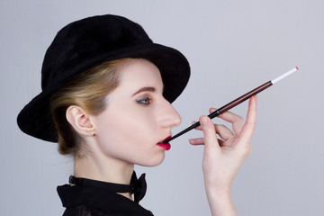 Portrait of a young woman in a hat