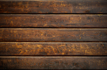 Fototapeta premium Old wooden background in rustic style. Dark wooden background with the structure and pattern of boards and panels. Copy space