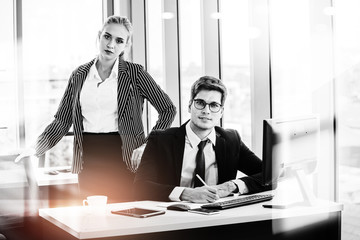 Business Black and white man working in a small office