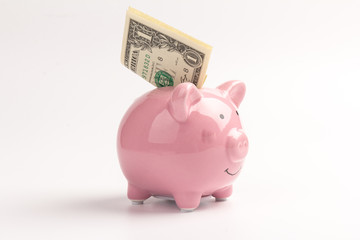 Piggy bank with dollar notes on white background, space for text. Finance, saving money
