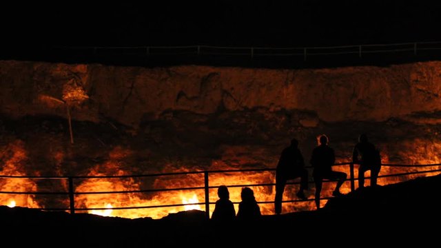  silhouette and fire darvaza gas crater