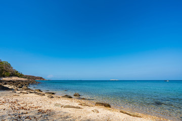 beautiful soft wave clear blue transparency sea ocean water and rocks at the bottom of the tropical paradise beach coast summer sea view at PP Island, Krabi, Phuket, Thailand.