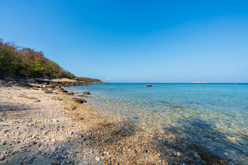 beautiful soft wave clear blue transparency sea ocean water and rocks at the bottom of the tropical paradise beach coast summer sea view at PP Island, Krabi, Phuket, Thailand.