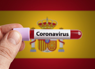 Scientist holding Coronavirus infected blood in test tube in front of Spain flag. Epidemic COVID-19 infection in countries in world concept.