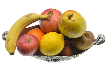 fresh fruits and vegetables  in a basket isolated on white background