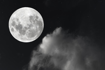Fototapeta na wymiar Full moon and blurred cloud on sky.