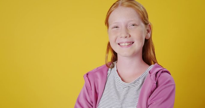 Slow Motion Portrait of White Confident Teenager Crossing Her Arms