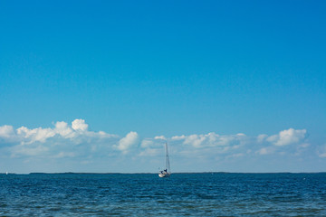 Sailboat in the middle of the ocean