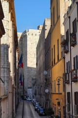 Fototapeta premium Via Università in Cagliari with the Elephant Tower in the background