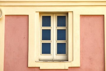 Fototapeta na wymiar Window on the facade of a house