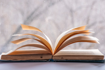 Old book closeup, book on a light background.