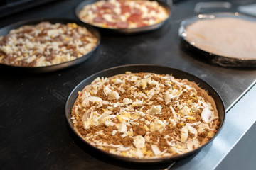 Mushroom pizza and meat before cooking