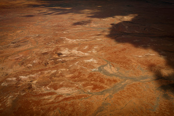 Kati Thanda-Lake Eyre Salt Flats outback South Australia aerial photography with little salt during the summer, brown baron lake textured background, Australia