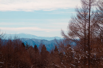 Fototapeta na wymiar winter mountain landscape and sky full of cloud