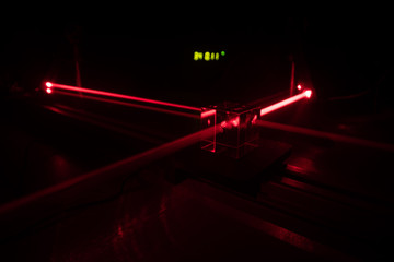 laser beam in optical laboratory