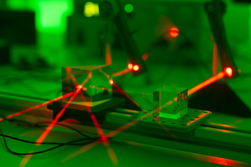 Experiment with a red laser in a physics lab