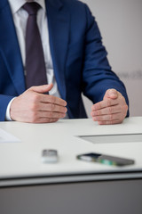 businessman, politician answers press questions in front of cameras, press conference