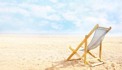 Deck chair on beach send empty copy space background,summer esort view,tourism banner.