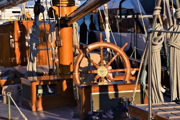 Sailboat deck wheel, masts and equipment detail