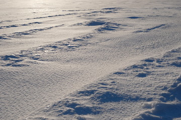 Snow surface against the sun.