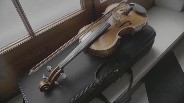 A beautiful scene of a violin ready to be used