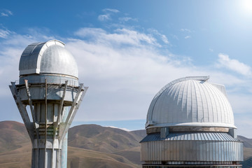Observatory telescope on green valley among mountains mountains in day, great design for any...