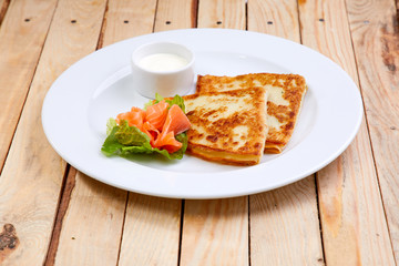 stuffed pancake with cheese and salmon