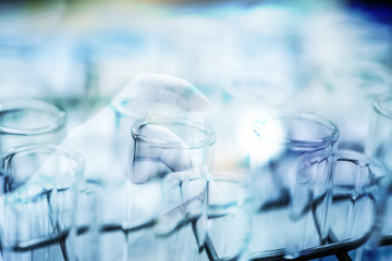 Double exposure test-tube in science background concept.