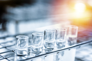 Double exposure test-tube in science background concept.