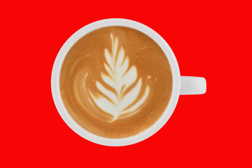 Top view of cups of coffee latte on colour background