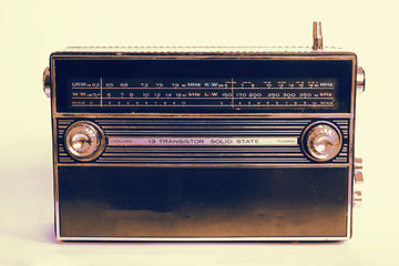 Old radio on white background. Radio antenna. Broadcast object. Minimalism background. Radio broadcasting. Musical record. Retro music. Vintage decorative element.