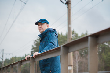 Crisis of middle age. Mature European man with a sad philosophical mood. The concept of life after 50 years, problems and depression.  