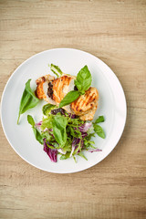 grilled chicken breast and salad