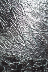 Obraz premium Surface of glass panel with stripes and bumps.