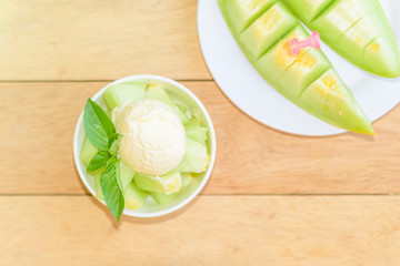 ice cream melon on wood table