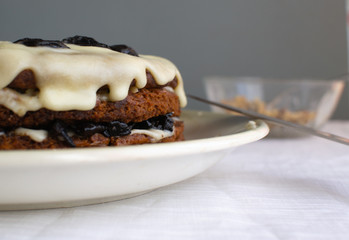 Homemade honey cake with prunes and cream.The most delicious pastry cooked at home with love.