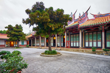 Fototapeta premium Tree in the back yard of Confucius Temple in Taipei