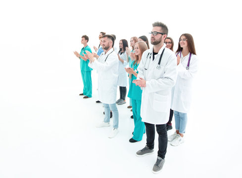 image of a large group of applauding medical professionals.
