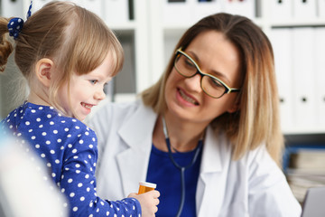 Little child with stethoscope at doctor reception. Physical exam cute infant portrait baby aid healthy lifestyle ward round child sickness specialist clinic test pulse concept