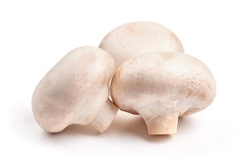 Champignon mushrooms, isolated on white background