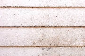 Bright dirty concrete wall with lines. Dirty concrete background